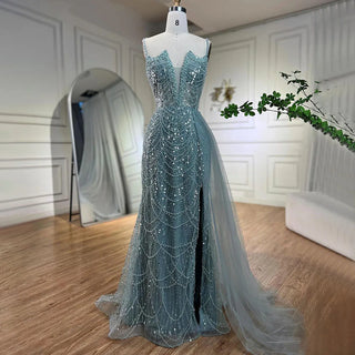 Desert Mirage: Nude High Split Mermaid Gown with Spaghetti Straps and Beading 2024