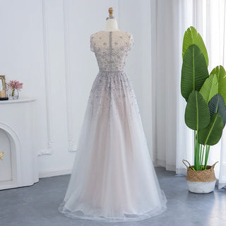 Dubai Elegance: Beaded Silver Evening Dress with Champagne and Burgundy Accents, Tailored for Plus Size Women at Wedding and Formal Parties.