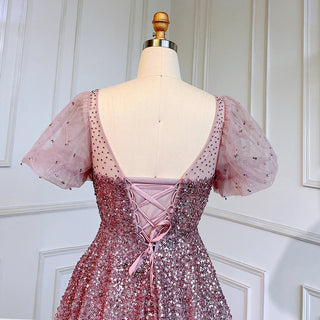 Desert Rose Elegance: Luxury Dubai-Inspired Evening Gown in Rose Pink with Burgundy & Gold Accents - An Arabic Masterpiece for Proms and Wedding Celebrations.