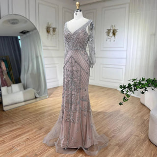 Dubai Glamour: 2024 Nude V-Neck Evening Dress with Crystal Embellishments, Sleeveless Shawl Yarn, and Formal Elegance