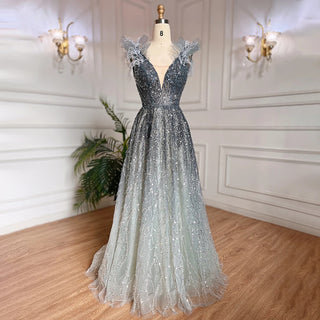Feathered Fantasy: 2024 Dubai-Inspired Evening Gown with Sexy V-Neck and Beaded Blue Elegance - The Ultimate Choice for Weddings and Grand Soirees.