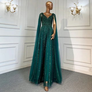 Desert Mirage: Dubai-Inspired Nude Evening Gown with Cape Sleeves Accented in Elegant Blue - A Vision of Grace for Weddings and Celebrations.