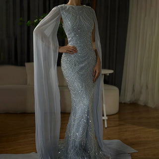 Ships in 1 to 3 Days - 2024 Saudi Arabia Blue Mermaid Evening Gown with Cape Sleeves and Luxury Beading for Formal Occasions