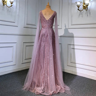 Desert Mirage: Dubai-Inspired Nude Evening Gown with Cape Sleeves Accented in Elegant Blue - A Vision of Grace for Weddings and Celebrations.