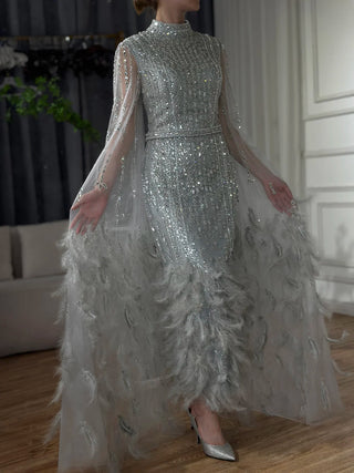 Ships in 1 to 3 Days - 2024 Silver Gray Mermaid Evening Gown with Cape Sleeves, Feathers, and Beaded Detailing - Ankle-Length Formal Dress