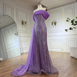 Ships in 1 to 3 Days - 2024 One-Shoulder Purple Mermaid Evening Gown with Beaded Side Skirt Overlay.