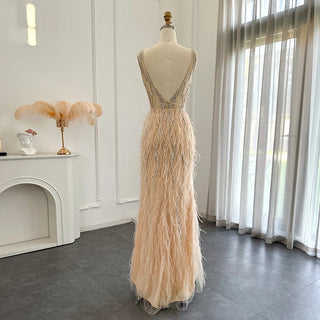 Dubai Champagne Elegance: Luxury Feathered Evening Dress with a V-Neck, Perfect for Women at Weddings and Formal Events, Ideal for Proms with a touch of Silver and Pink.