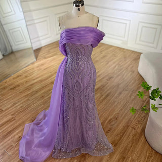 Ships in 1 to 3 Days - 2024 One-Shoulder Purple Mermaid Evening Gown with Beaded Side Skirt Overlay.