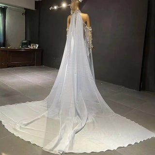 Crystal Pearl Majesty: Dubai-Inspired Evening Gown with Elegant Cape and High Neck - The Quintessence of Formal Wear for Weddings.