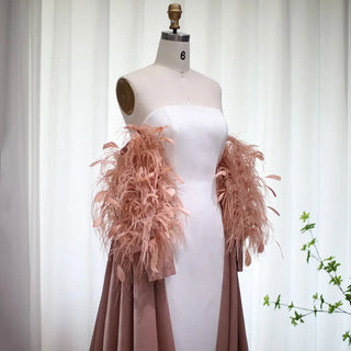 Dubai Petal Elegance: Rose Pink Feathered Gown with Cape for Women's Formal Wedding Festivities.