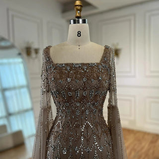 Ships in 2 to 5 Days - Luxury Caramel Saudi-Inspired Evening Dress – Elegant Gown with Long Sleeves and Flowing Cape