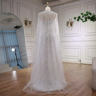 2025 Luxury White Beaded Mermaid Evening Gown with Long Cape – Dubai-Inspired Arabic Formal Dress