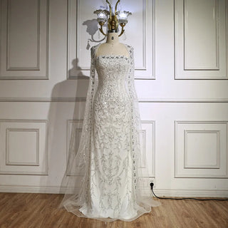 2025 Luxury White Beaded Mermaid Evening Gown with Long Cape – Dubai-Inspired Arabic Formal Dress