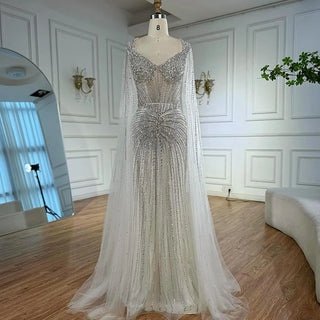 Ships in 2 to 5 Days - Luxury Nude Beaded Evening Dress – Saudi-Inspired Formal Gown with Cape Sleeves