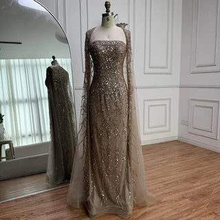 2025 Luxury White Beaded Mermaid Evening Gown with Long Cape – Dubai-Inspired Arabic Formal Dress