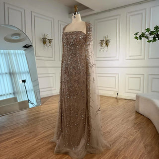2025 Luxury White Beaded Mermaid Evening Gown with Long Cape – Dubai-Inspired Arabic Formal Dress