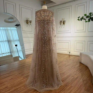 2025 Luxury White Beaded Mermaid Evening Gown with Long Cape – Dubai-Inspired Arabic Formal Dress