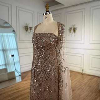 2025 Luxury White Beaded Mermaid Evening Gown with Long Cape – Dubai-Inspired Arabic Formal Dress