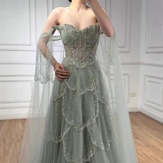 Ships in 2 to 5 Days - Sage Green Luxury Arabic Off-Shoulder Beaded A-Line Evening Dress with Cape Sleeves – 2025 Collection