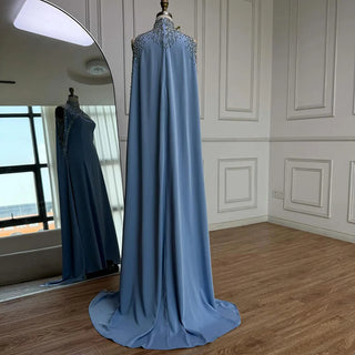 Elegant Blue High-Neck Evening Gown with Crystal Beading & Flowing Long Cape