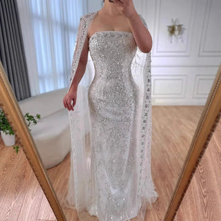 2025 Luxury White Beaded Mermaid Evening Gown with Long Cape – Dubai-Inspired Arabic Formal Dress