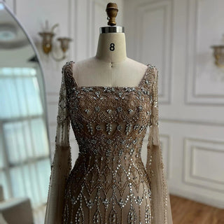 Ships in 2 to 5 Days - Luxury Caramel Saudi-Inspired Evening Dress – Elegant Gown with Long Sleeves and Flowing Cape