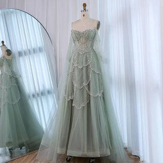Ships in 2 to 5 Days - Sage Green Luxury Arabic Off-Shoulder Beaded A-Line Evening Dress with Cape Sleeves – 2025 Collection
