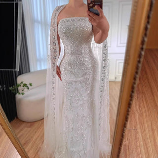 2025 Luxury White Beaded Mermaid Evening Gown with Long Cape – Dubai-Inspired Arabic Formal Dress